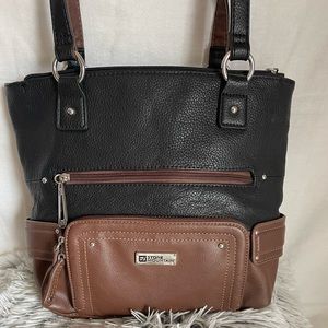 Stone Mountain bag of soft grain leather. Numerous pockets. Exceptional details!